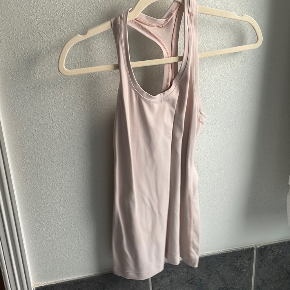 Light pink lululemon razor back tank top size 4